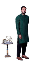 BOTTLE GREEN SEQUENCE EMBOSSED KURTA PAJAMA.