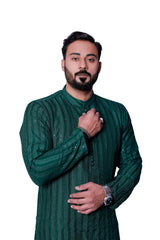 BOTTLE GREEN SEQUENCE EMBOSSED KURTA PAJAMA.