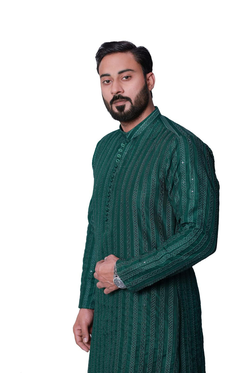 BOTTLE GREEN SEQUENCE EMBOSSED KURTA PAJAMA.