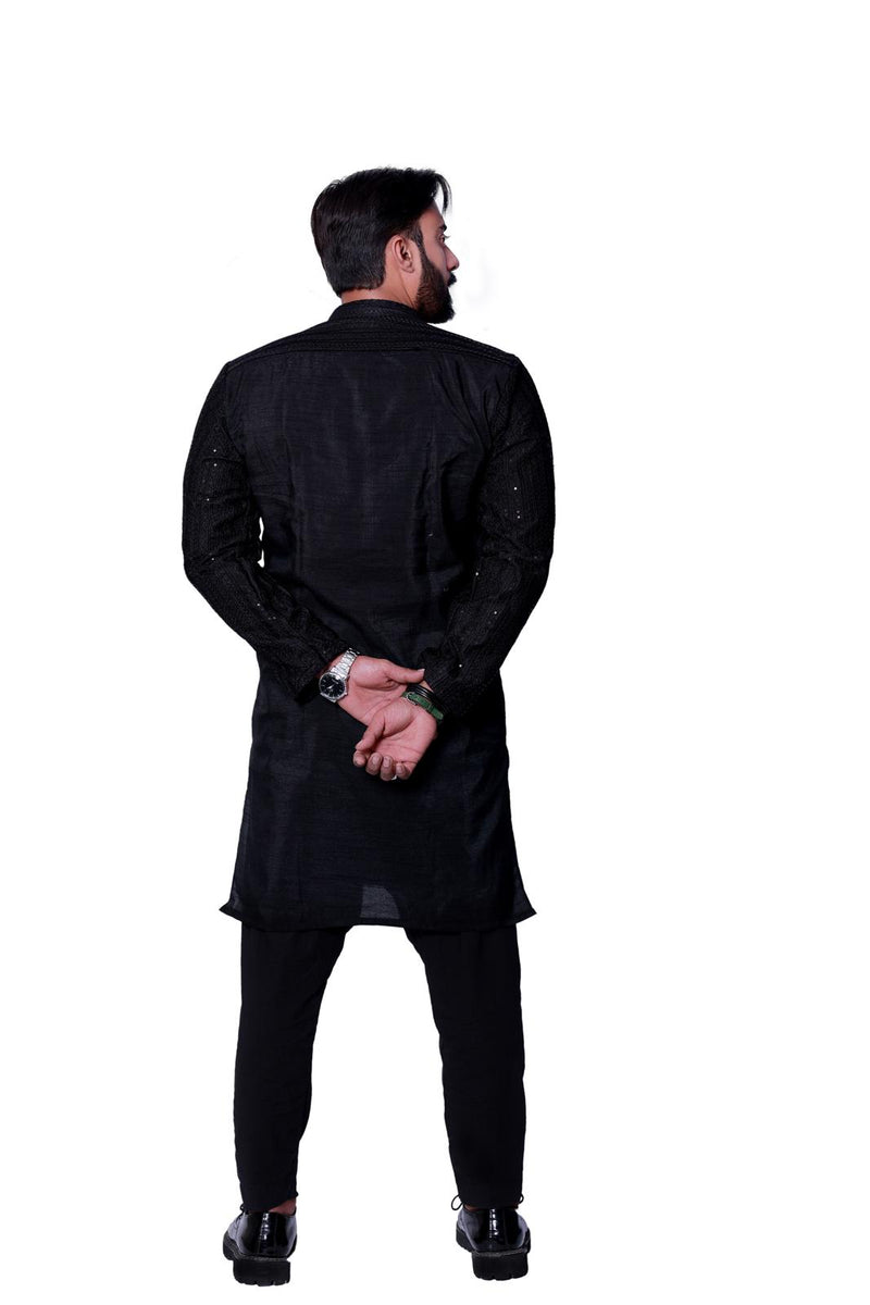 JET BLACK SEQUENCE EMBOSSED KURTA PAJAMA BACK RAW SILK.