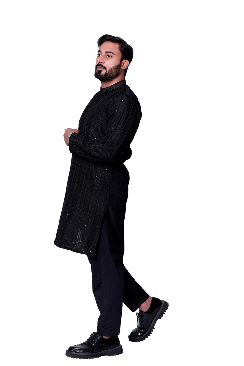 JET BLACK SEQUENCE EMBOSSED KURTA PAJAMA BACK RAW SILK.