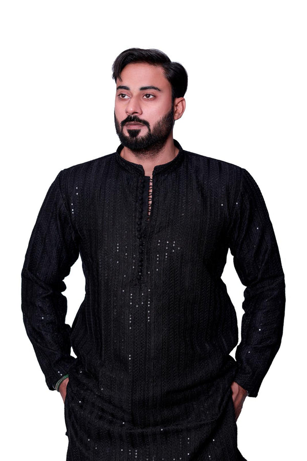 JET BLACK SEQUENCE EMBOSSED KURTA PAJAMA BACK RAW SILK.