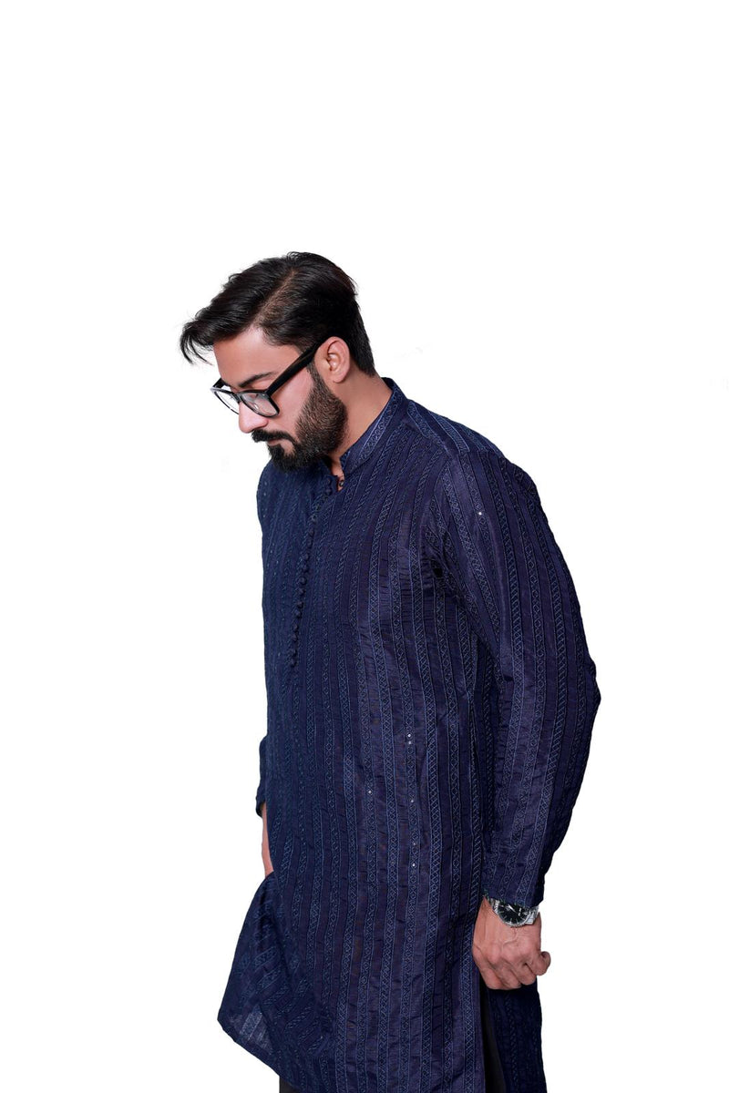 BLUE SEQUENCE EMBOSSED KURTA PAJAMA.