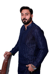 BLUE SEQUENCE EMBOSSED KURTA PAJAMA.